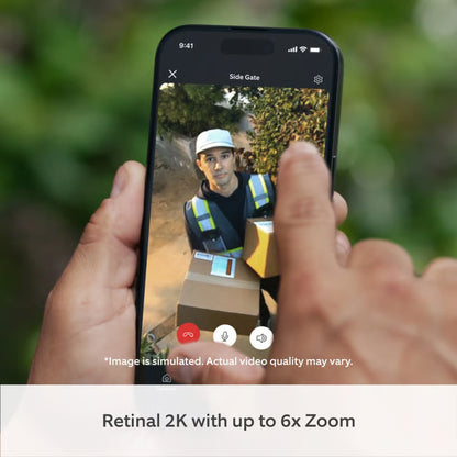Ring Outdoor Cam Plus Battery Hvid vises på mobilen med Retinal 2K-video og op til 6x zoom under videosamtaler.
