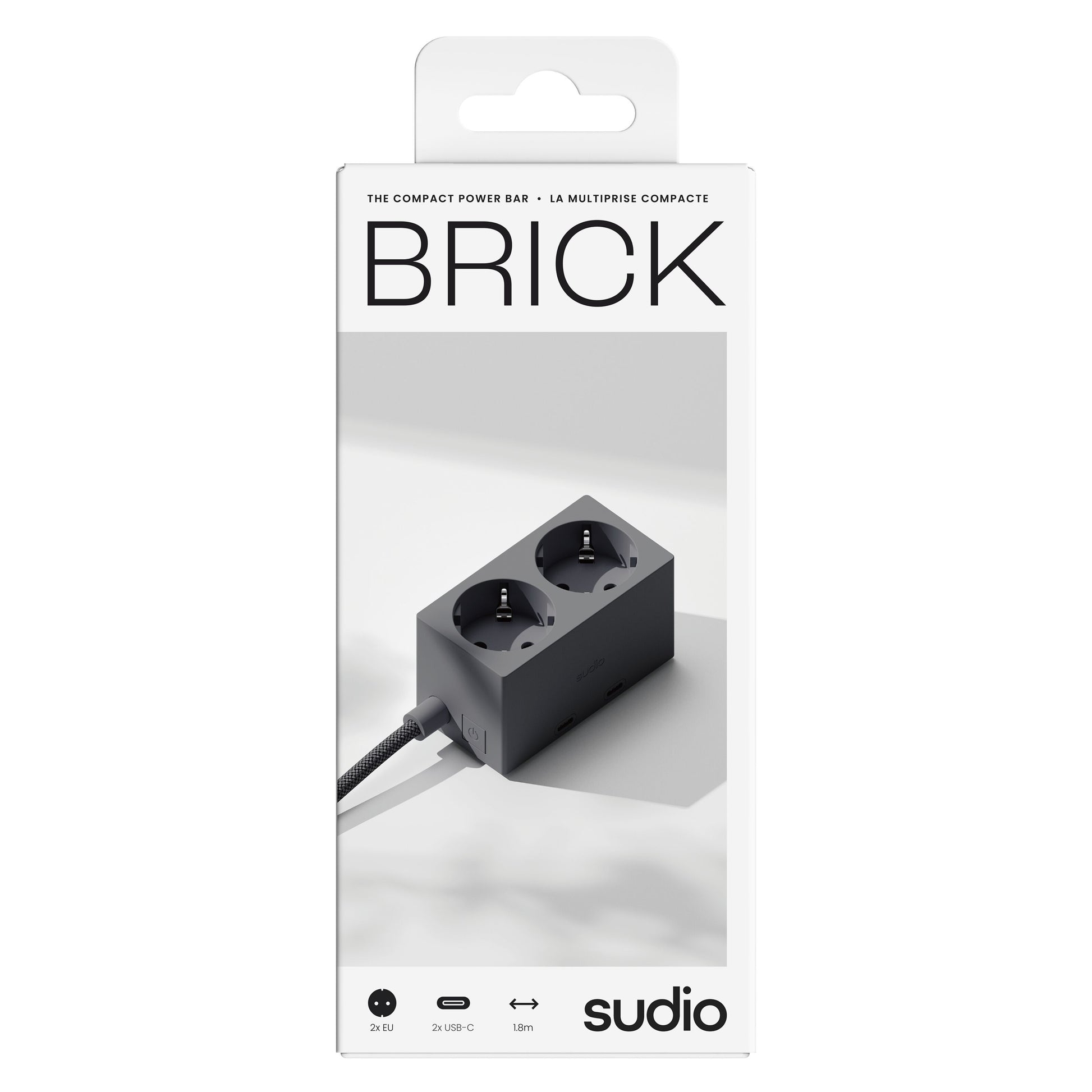 Sudio Vægudtag med GaN-opladning 30 W Sort, to udtag, to USB-porte inkl. USB-C, ledning, Sudio-logo på æske.