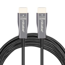 Nikabe Optisk HDMI 2.1 kabel sort, DISPLAY og SOURCE mærket, coilet kabel, 8K/60 Hz eller 4K/120 Hz op til 20 m.