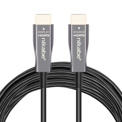 Nikabe Optisk HDMI 2.1 kabel sort, DISPLAY og SOURCE mærket, coilet kabel, 8K/60 Hz eller 4K/120 Hz op til 20 m.