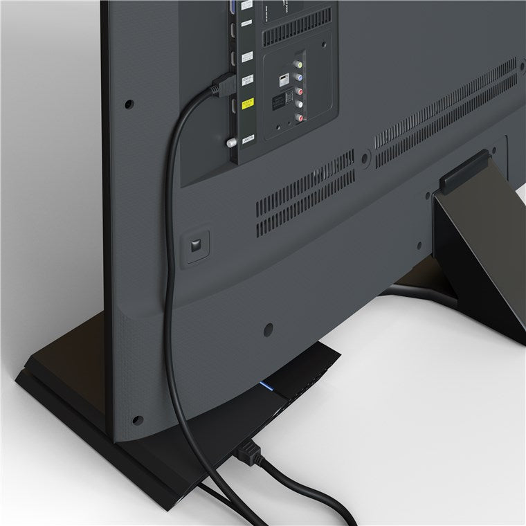 Bagtil af fladskærms-tv på sort fod med tilsluttede porte og Goobay HDMI Kabel 4K/60Hz 1,5 m Sort.
