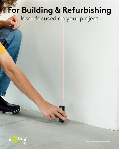 Goobay Laser afstandsmåler sigter mod hvid væg med synlig rød laserlinje.
