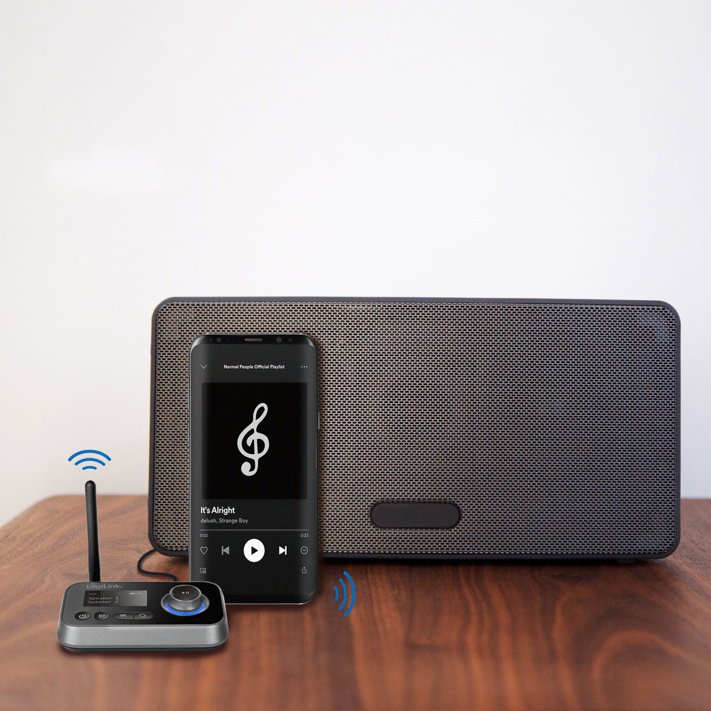 Logilink Bluetooth 5.0 lydsender/modtager TX/RX sort ved siden af sort bærbar højttaler og smartphone, blå trådløs ikon.