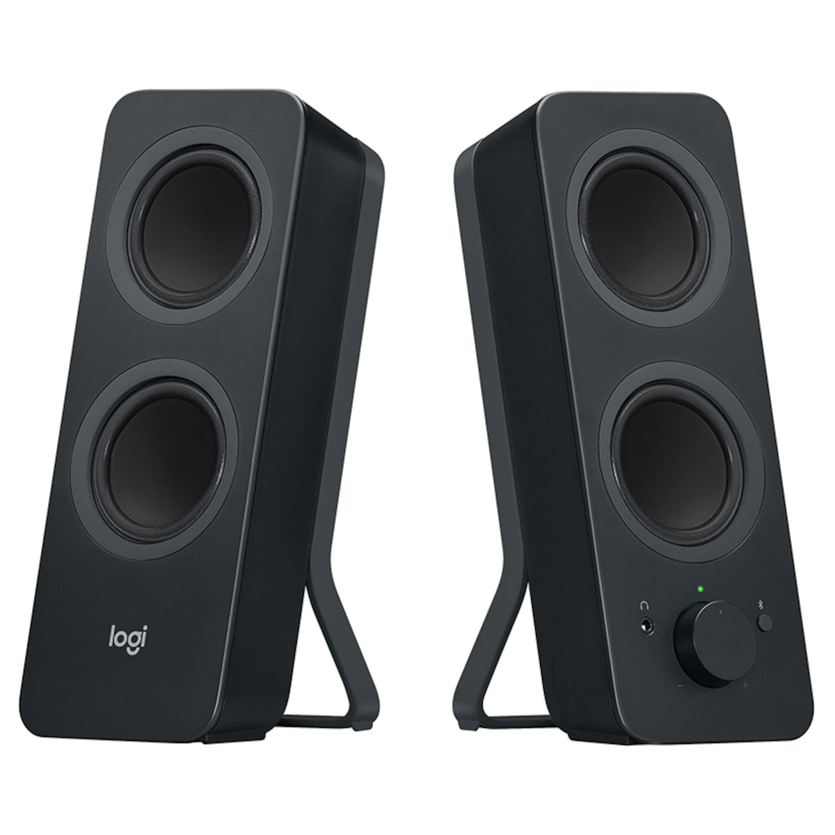 Logitech Z207 Bluetooth-computerhøjttalere, to sorte højttalere med dobbelte drivere, lydstyrkeknap og hovedtelefonstik.