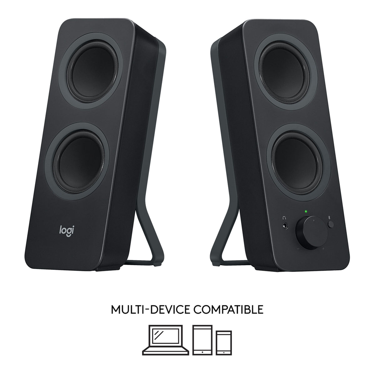 Logitech Z207 sorte computerhøjttalere med lydstyrkeknap, jackstik og Bluetooth-knap med ikoner, der angiver enhedskompatibilitet.