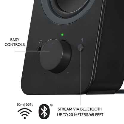 Logitech Z207 Bluetooth-højttalere, sorte, med lydstyrkeknap, hovedtelefonstik, Bluetooth-knap og en rækkevidde på 20 meter.