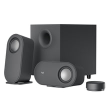 Logitech Z407 højttalersystem, to sorte højttalere, subwoofer og trådløs cylindrisk lydstyrkekontrol.