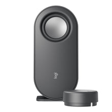 Logitech Z407 højttalersystem med subwoofer, stående oval højttaler og rund trådløs lydstyrkeknap.