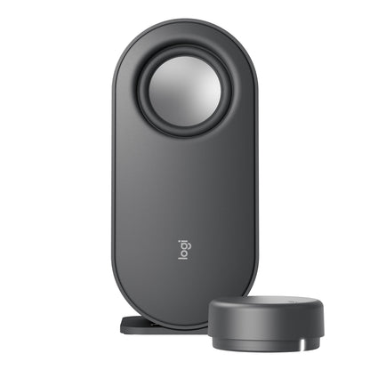 Logitech Z407 højttalersystem med subwoofer, stående oval højttaler og rund trådløs lydstyrkeknap.