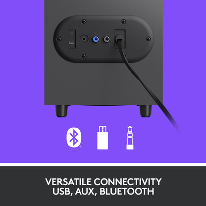 Bagsiden af Logitech Z407-subwooferen med USB-, AUX- og lydporte samt ikoner for Bluetooth, USB og 3,5 mm-tilslutning.