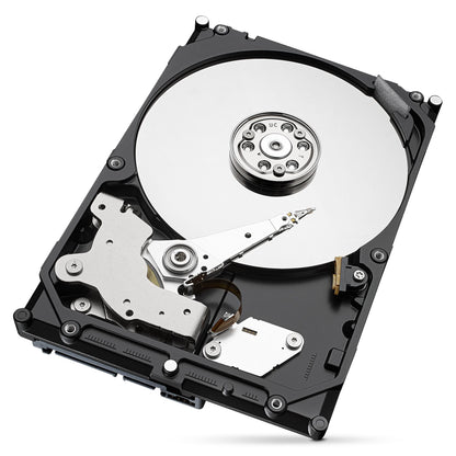 Seagate Barracuda 3,5" intern harddisk 2TB åben med synlig sølvplade, spindel og læse/skrivearm i sort kabinet.