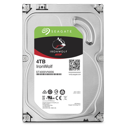 Seagate IronWolf 3,5" intern harddisk 4TB til NAS, model ST4000VN006, label og certifikationslogoer på sølvmetal-kabinet.