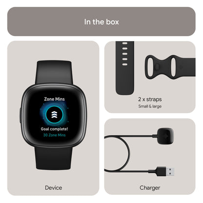 Fitbit Versa 4 aktivitetsur sort/graphite, "Goal complete 30 Zone Mins" på display, to remme, USB oplader, GPS.