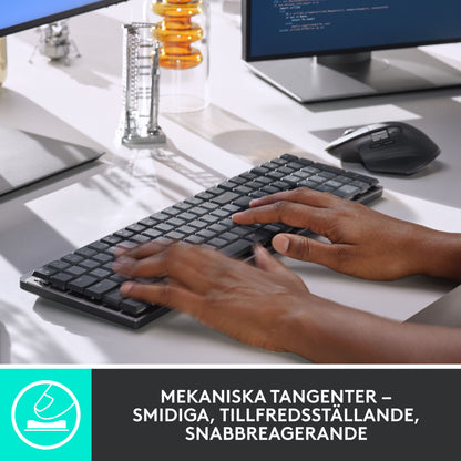 Logitech MX Mechanical trådløst mekanisk tastatur, Tactile Quiet (Brown) med ergonomisk mus på skrivebordet.