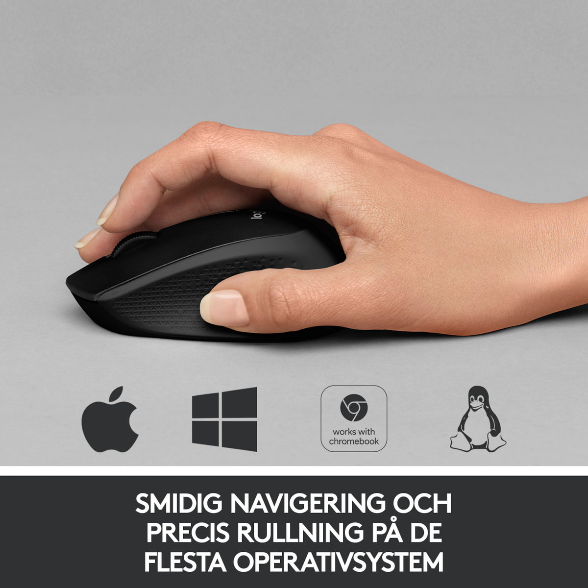 Hånd, der bruger en Logitech M330 Silent trådløs mus med ikoner til Apple, Windows, Chromebook og Linux.
