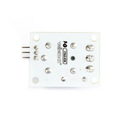 Luxorparts relæmodul til Arduino 1x, hvid, tre ben, metal loddepunkter, set oppefra, Luxorparts-logo synligt.