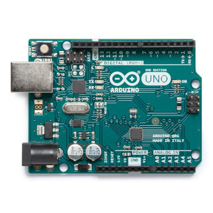 Arduino Uno Rev. 3 SMD udviklingskort med ATmega328P mikrocontroller, USB-port og header pins.