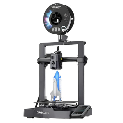 Creality Ender 3 v3 KE 3D-printer med filamentrulle ovnpå, blå/hvid rumfærgemodel, touchskærm forrest til højre.