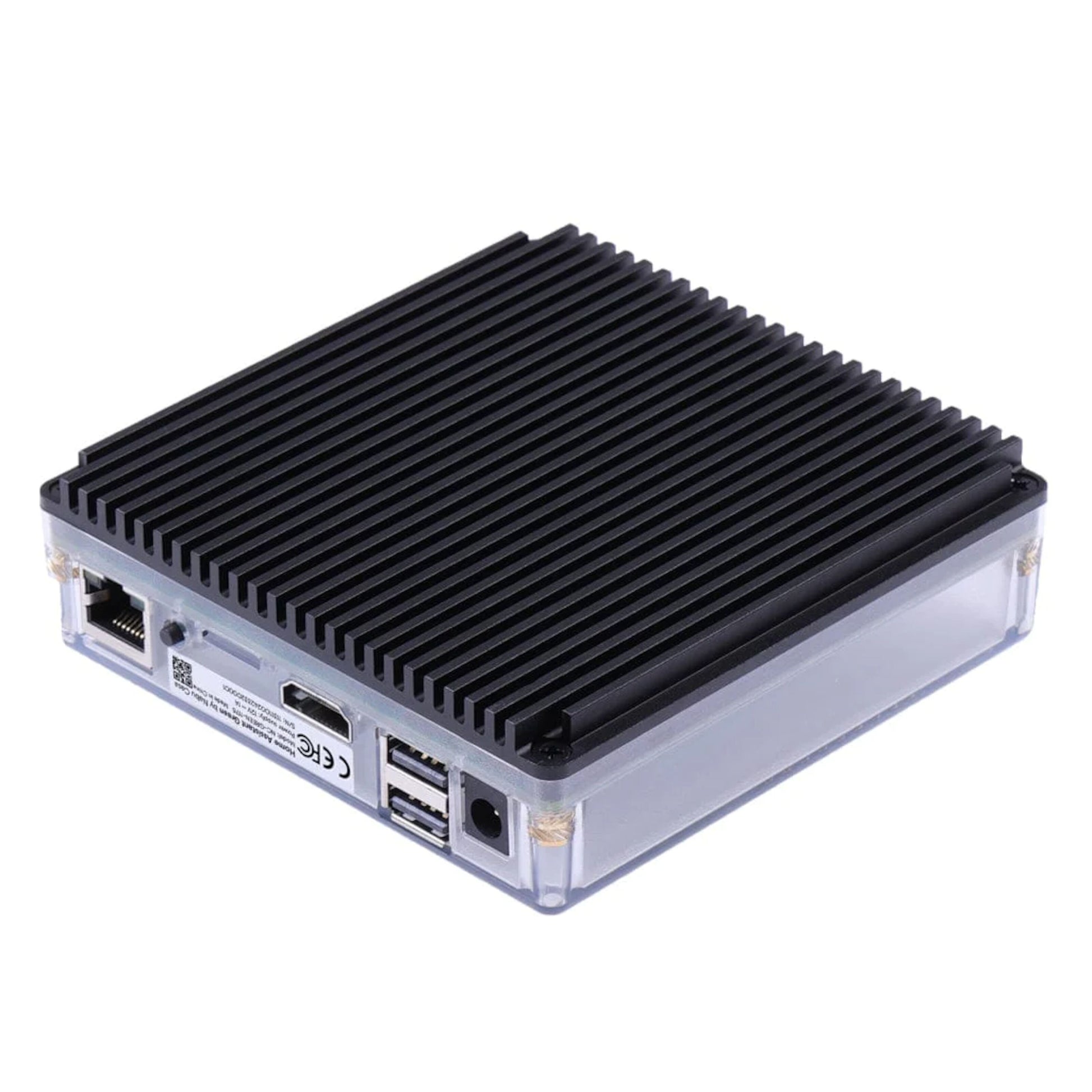 Nabu Casa Hjemmeassistent Grøn mini PC med ribbet sort top, klare sider, Ethernet, USB, HDMI og lydporte.