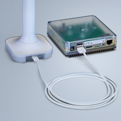 Connect ZBT-2 gennemsigtig hub med USB- og Ethernet-porte, hvidt kabel tilsluttes, egnet til Raspberry Pi, box-formet design.