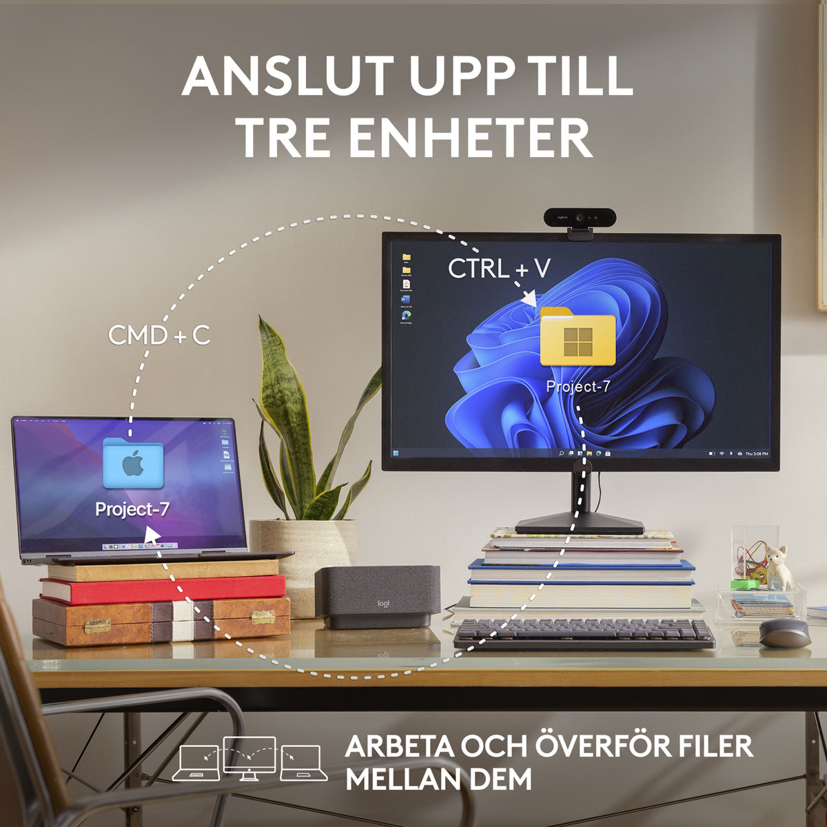 Logitech MX Anywhere 3S trådløs mus i farven Graphite, tilsluttet bærbar computer og skærm via filoverførsel.