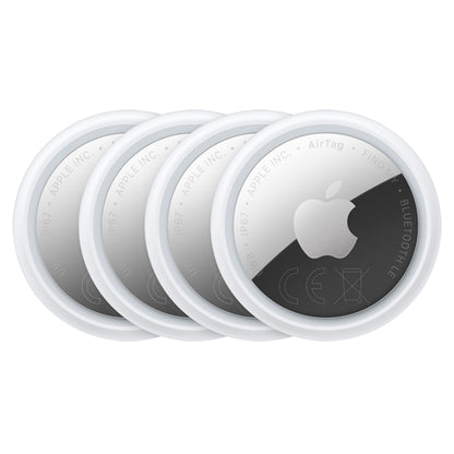 Apple AirTag 2. gen 4-pak runde hvide og sølv Bluetooth-enheder med Apple-logo og detaljeret overflade.