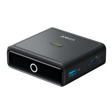 Anker 100W opladningsstation til Prime Powerbank i sort med GaN-teknologi, rund frontlys og flere USB-porte på siden.