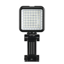 Hama 49 BD LED-belysning, kompakt kvadratisk lampe med sort ramme og justerbart beslag til mobil og kamera.