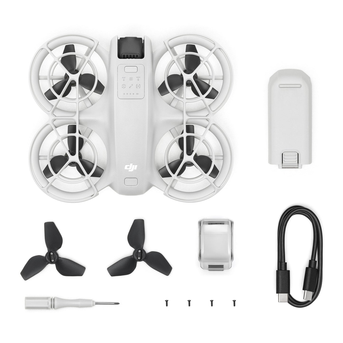 DJI Neo hvid kompakt drone kit med drone, batteri, to propeller, skruetrækker, brandskruer, propelbeskyttere og USB-C kabel.