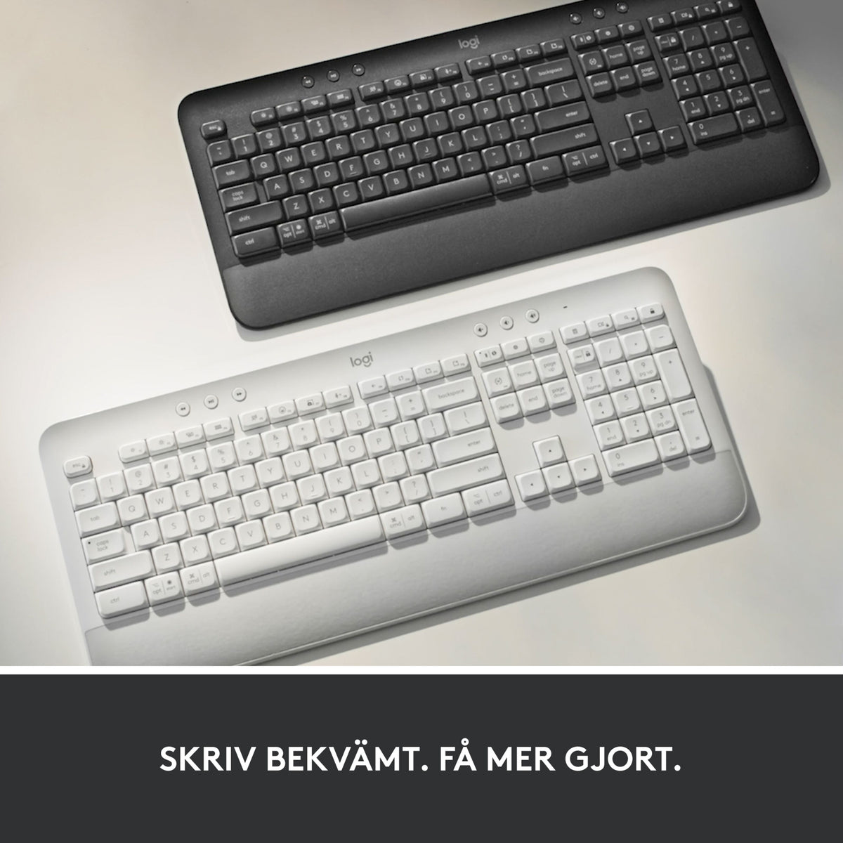 Logitech Signature K650 trådløst tastatur i grafit og off-white med håndledsstøtte.