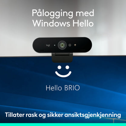 Logitech Brio 4K-webkamera monteret på skærmen med Windows Hello-login-skærm.