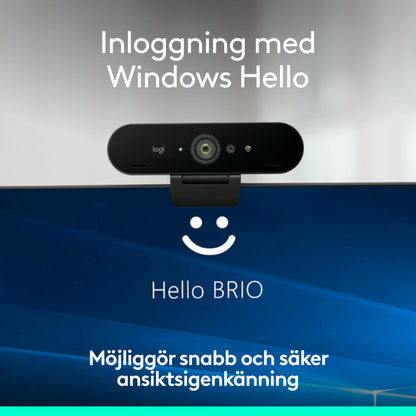 Logitech Brio 4K-webkamera med Windows Hello monteret på computerskærmen med ansigtsgenkendelse.