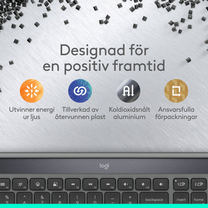 Logitech Signature Slim Solar+ trådløst tastatur i genbrugsplast og aluminium med solcellepanel og funktionstaster.