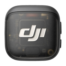 DJI Mic 3 Sender sort trådløs mikrofontransmitter med hvidt DJI-logo, afrundede hjørner og delvis gennemsigtig kabine.