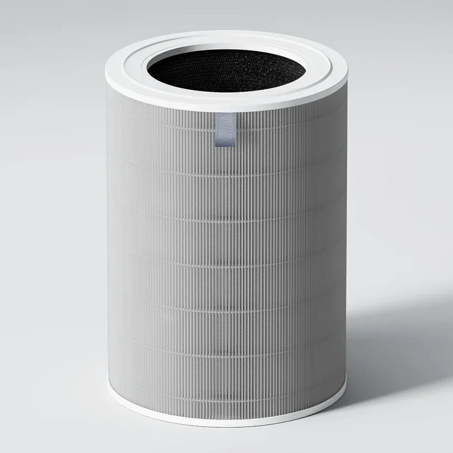 Xiaomi Smart Luftrenser 6 cylindrisk filter, hvid yderside, grå lodrette linjer, stofstrop øverst.