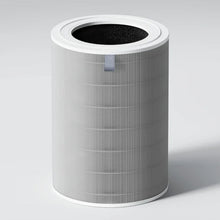 Xiaomi Smart Luftrenser 6 cylindrisk filter, hvid yderside, grå lodrette linjer, stofstrop øverst.