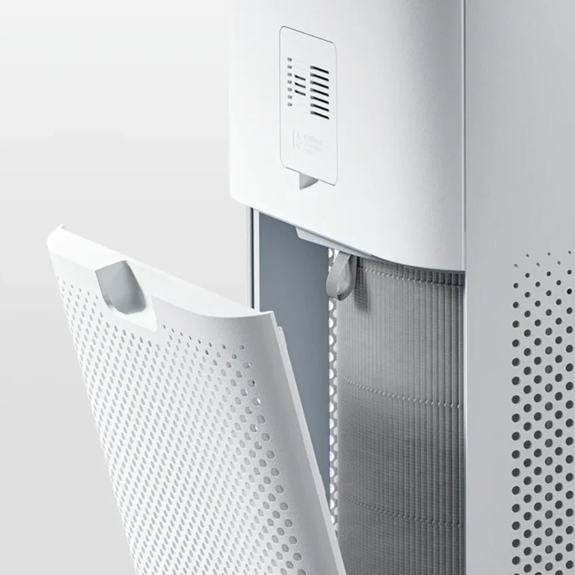 Xiaomi Smart Luftrenser 6 Filter, front åbnet, synligt cylinderfilter og perforerede lufthuller.