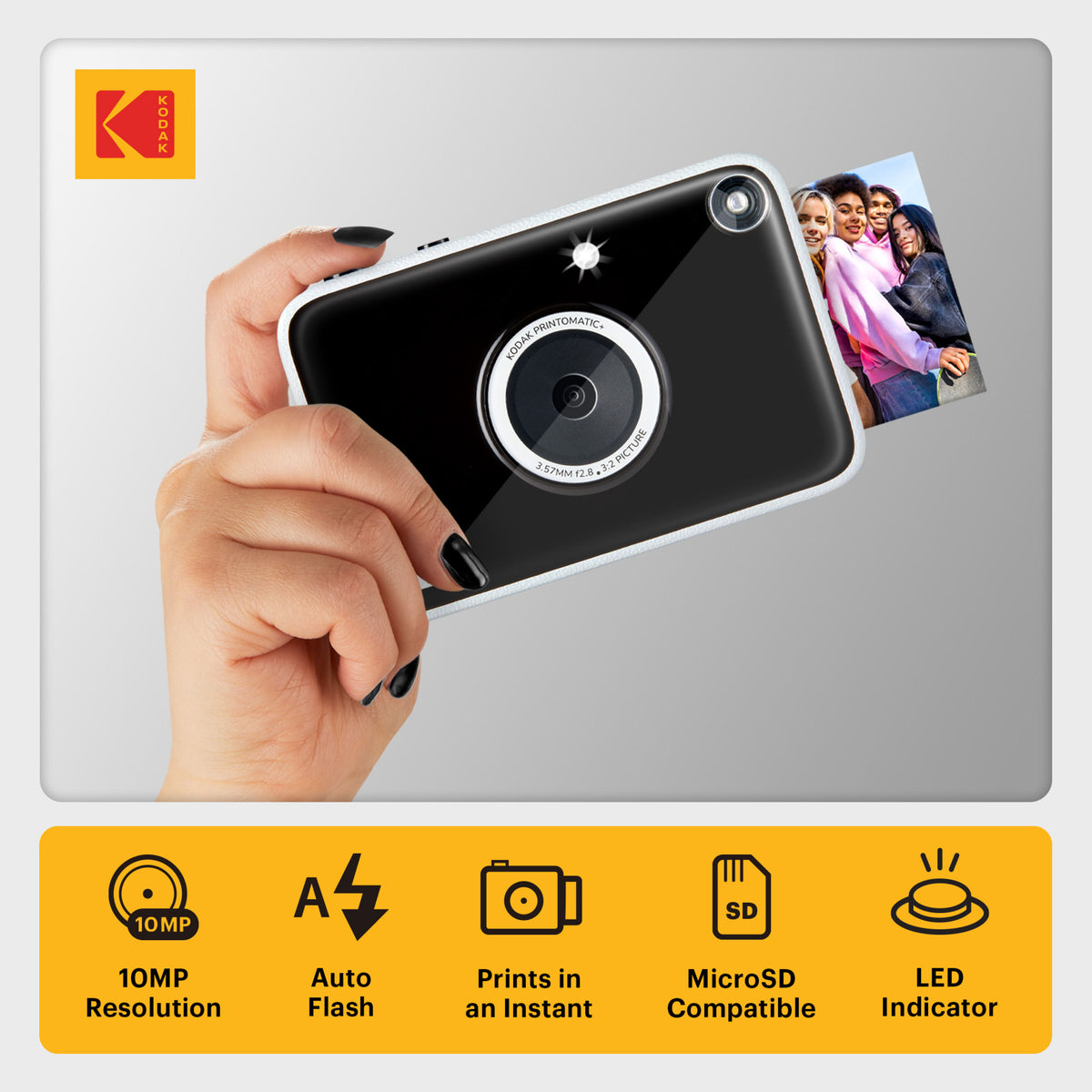 Sort Kodak Printomatic+-øjeblikskamera med 10 MP, ZINK-udskrivning, microSD, automatisk blitz og LED, plads til et billede af fire venner.