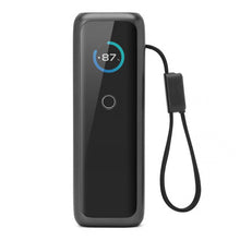 LINOCELL Powerbank 165 W PD 27.600 mAh, sort med rund digital skærm, USB-C, tallet 87 vises, én knap og håndledsrem.