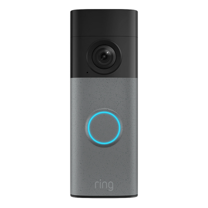 Ring Battery Video Doorbell Retinal 2K med gråmønstret kamera over en blå knap i et sølv-sort kabinet med bevægelsesdetektering.