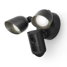 Ring Floodlight Cam Pro Retinal 2K-overvågningskamera i sort med to LED-lamper, centralt kameramodul og 2K-video.