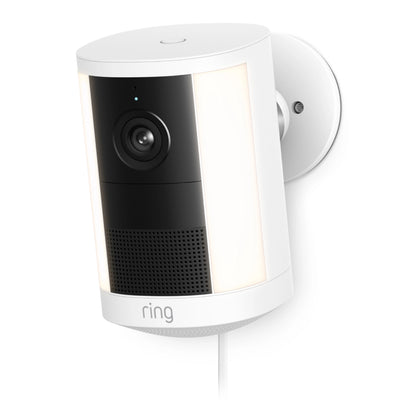 Ring Spotlight Cam Plug-in Retinal 2K, hvid med sort linsefelt, indbyggede spotlights, synligt strømkabel, logo under gitteret.