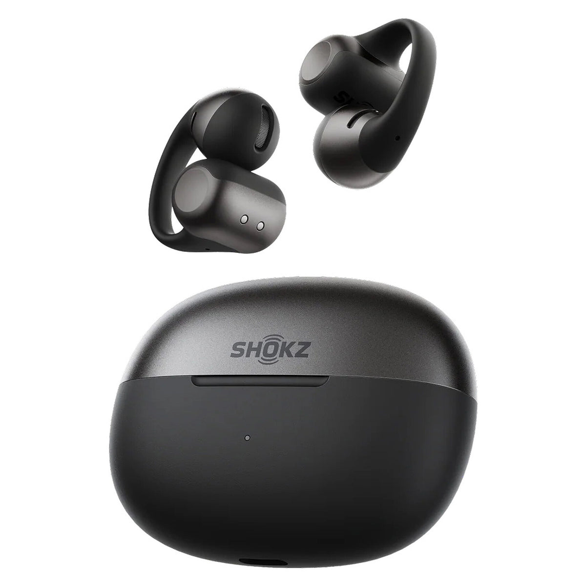 Shokz OpenDots 2 åbne clip-on-høretelefoner i sort med ørekroge og DirectPitch-teknologi i et ovalt SHOKZ-opladningsetui.