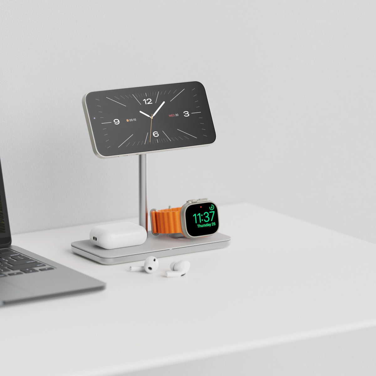 Linq 3-i-1 Qi2 trådløs opladningsholder med smartphone i liggende format, Apple Watch og opladningsetui til øretelefoner.