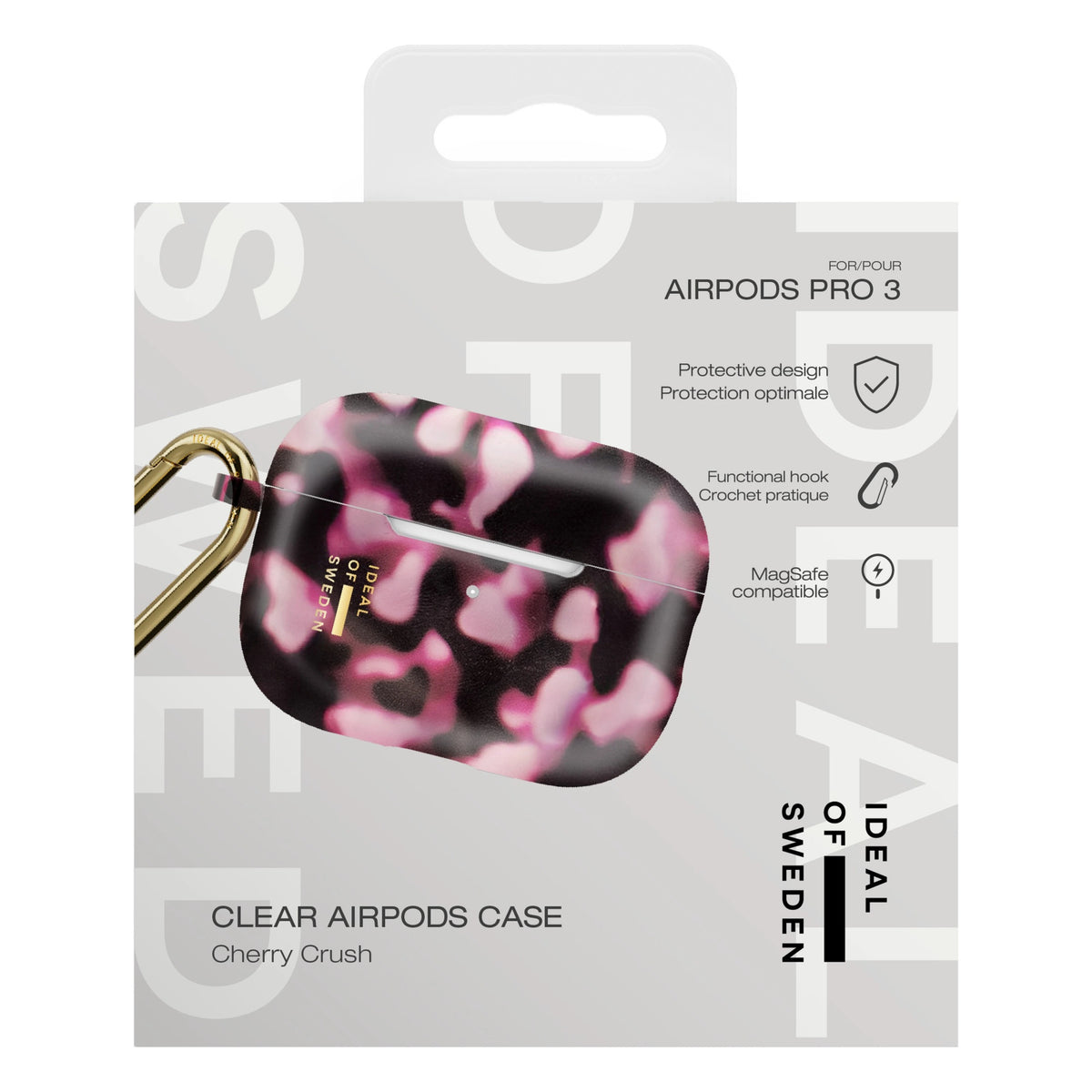 IDeal of Sweden gennemsigtigt etui til AirPods Pro, Cherry Crush, med guldkarabinhage i emballagen.