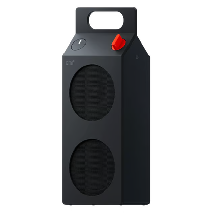 Nothing CMF Speaker M – bærbar Bluetooth-højttaler i mørkegrå med to frontelementer, bærehåndtag, tænd-knap og rødt drejeknap.
