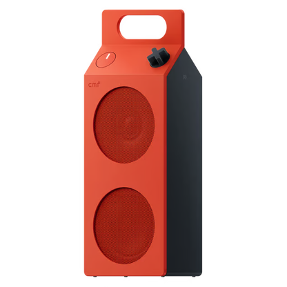 Orange Nothing CMF Speaker M – bærbar Bluetooth-højttaler med bærehåndtag, to runde højttalergitter og lydstyrkeknap.