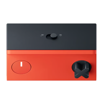 Orange og sort Nothing CMF Speaker M Bluetooth-højttaler med lydstyrkeknap, tænd/sluk-knap og indikatorlampe.