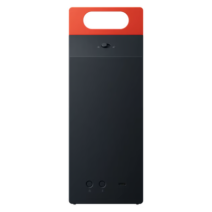 Nothing CMF Speaker M – bærbar Bluetooth-højttaler i mørkegrå med orange bærehåndtag, drejeknap, to knapper og USB-C-port.