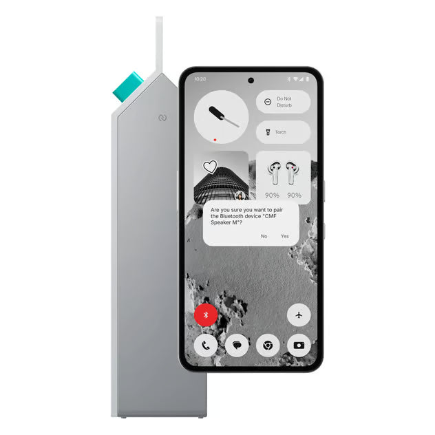 Nothing CMF Speaker M – bærbar Bluetooth-højttaler i hvid ved siden af en smartphone med parringsmeddelelse.